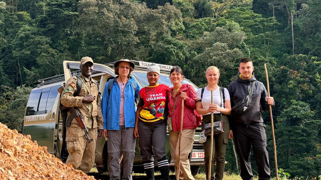 African safari local Expert-Taffie with a client after Gorrila Trek
